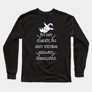 I'm not clumsy, I'm just testing gravity. Regularly. Long Sleeve T-Shirt